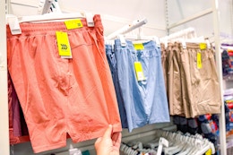 all in motion men's shorts sitting on a target clothing rack