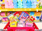 peeps sitting in a parked target cart in front of peeps display