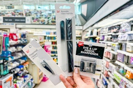 hand holding walgreens brand beauty tools