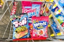 trolli, nerds, and sweetarts candy in a cart