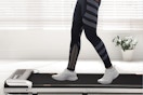 a woman on a walking pad
