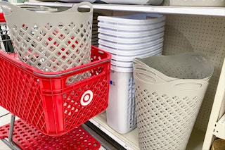laundry hampers on a target shelf and in a target cart