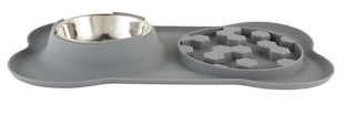 a grey dog mat with a puzzle feeder and a bowl