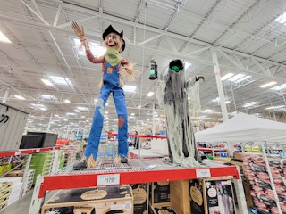displays of tall scarecrows and phantoms