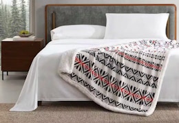eddie bauer throw blanket sitting on a bed