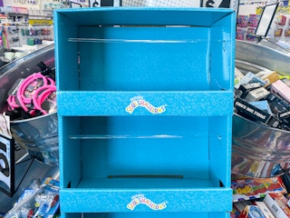 An empty Squishmallow shelf inside Five Below