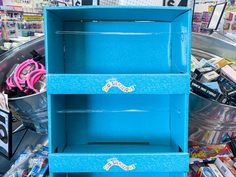 An empty Squishmallow shelf inside Five Below