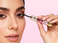 a person applying lash serum