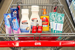 crest and toms toothpaste, palmers lotion, chi iron guard spray, and tree hut hand soap in a cart