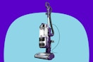 Shark Lift-Away Upright Vacuum on a blue background.