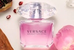 a pink bottle of perfume