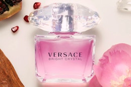 a pink bottle of perfume