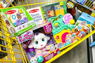 yellow shopping cart filled with toys