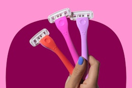 Three Billie razors: red, pink and purple, the sunburst set