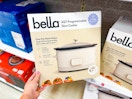hand grabbing a bella slow cooker off a target shelf
