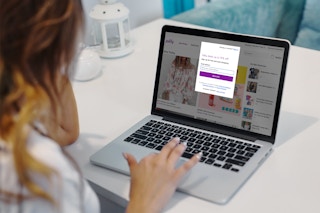 woman visits zulilly.com on her laptop