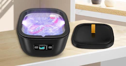 a retainer cleaner machine on a table