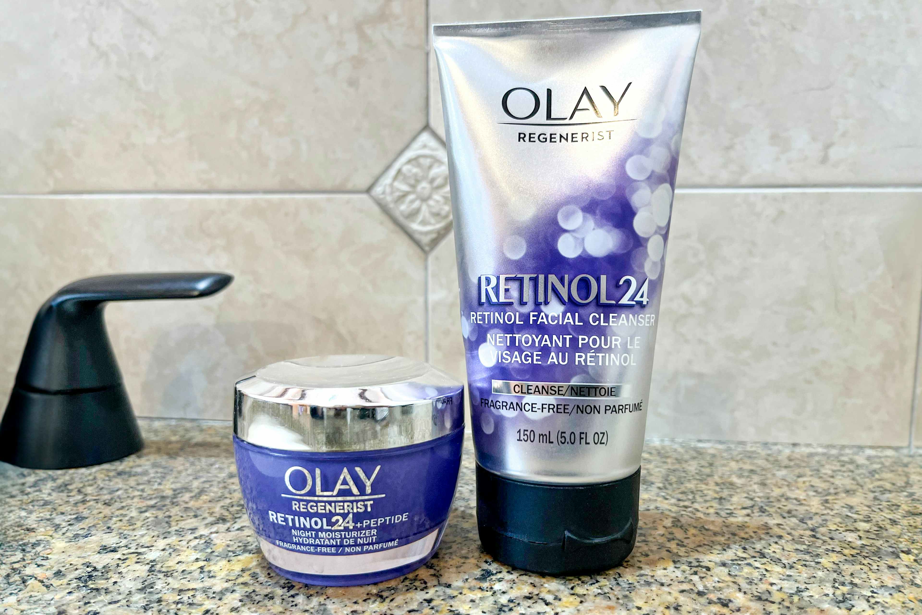olay regenerist retinol facial cleanser and moisturizer on a bathroom counter