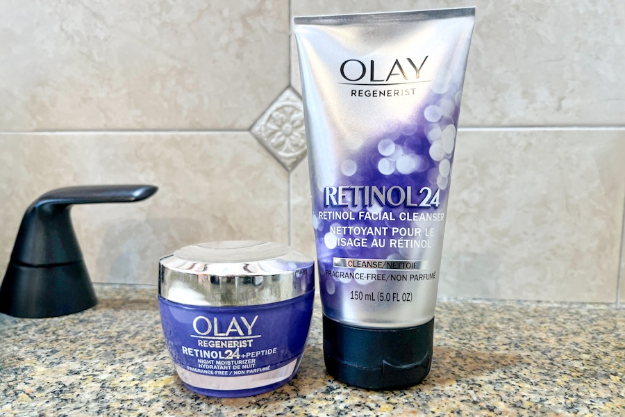 olay regenerist retinol facial cleanser and moisturizer on a bathroom counter