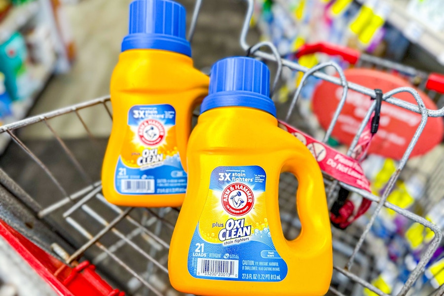 2 arm and hammer laundry detergents in a cart
