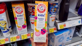 walmart arm and hammer kids toothpaste hand holding