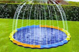 Lifestyle image of a splash pad set up outdoors