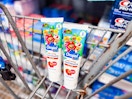 2 Orajel Mario toothpaste tubes in Walmart shopping cart
