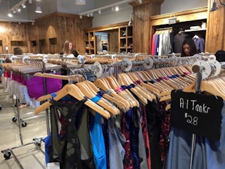 interior of a lululemon outlet store with clothes displays