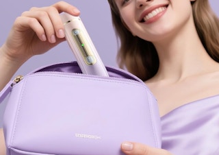a person putting a bikini trimmer in a purple bag