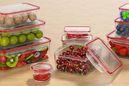 AdanZst 44-Piece Reusable Food Storage Container Set being used on a kitchen counter for food.