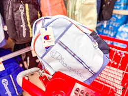 champion backpack sitting on top a target cart