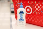cetaphil baby wash in front of a target shopping basket