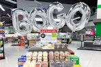 large balloon sign for a bogo sale at publix
