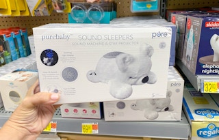 walmart purebaby sound machine and star projector hand holding