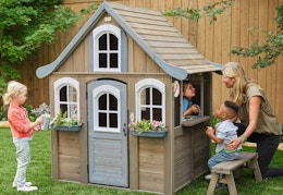 Save $100 on a KidKraft Outdoor Playhouse at Walmart — Now $230 card image