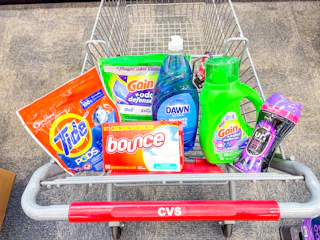 tide pods, gain flings, dawn dish soap, bounce dryer sheets, gain detergent, and downy unstoppables in a cart