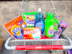 tide pods, gain flings, dawn dish soap, bounce dryer sheets, gain detergent, and downy unstoppables in a cart