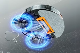 Lifestyle image of the underneath angle of the vacuum mop in action