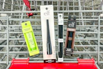 elf lip balm, eyeliner, lip pen, and brow gel in a cart
