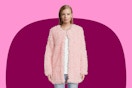 Model wearing a pink No Boundaries Juniors Faux Fur Jacket