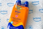 an orange pack of sunscreen 