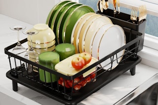 a dish drainer rack on a counter