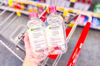 hand holding two garnier micellar waters