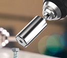 a socket tool next to a nail