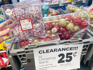 A table with Christmas dfecorations on clearance for $0.25 each at Dollar General.