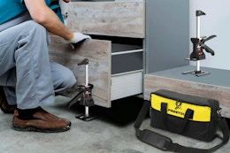 HolaYou Labor Saving Arm Jack(2 Pcs),Multi-Function Height Adjustment being used by a guy.