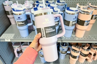 hand holding Stanly cup at Dick's on shelf