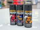 3 axe body sprays together on a walmart table
