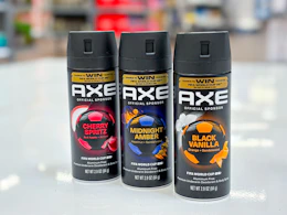 3 axe body sprays together on a walmart table