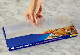 sheets of parchment paper coming out of a box